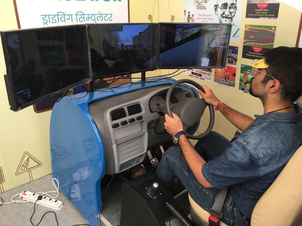 Three screen car driving training simulator